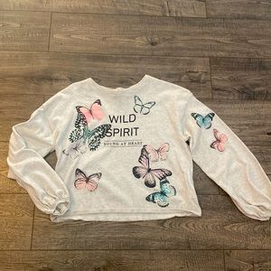 Girl’s Wild Spirit sweater with peasant sleeve. Size 12/14